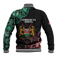 Black baseball jacket back with Jamhuriya Kenya text, lions crest, green leaf pattern.
