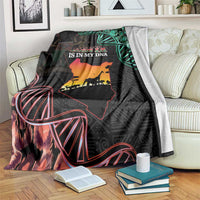 Black Kenya map blanket with green accents, red line art, and 'KENYA IS IN MY DNA'.
