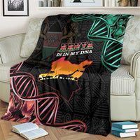 Black blanket showing Kenya silhouette map with green accents and red line art motifs.