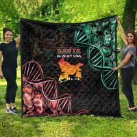 Black quilt blanket with Kenya map, green DNA helix border, and red line accents