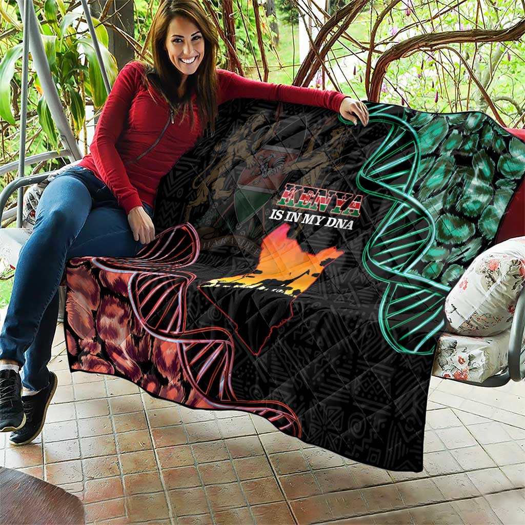 Black quilt blanket spread out with Kenya map, green DNA helix, and red line design