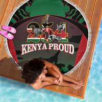 Round fringe beach blanket with safari animals and 'Kenya Proud' graphic in green/black