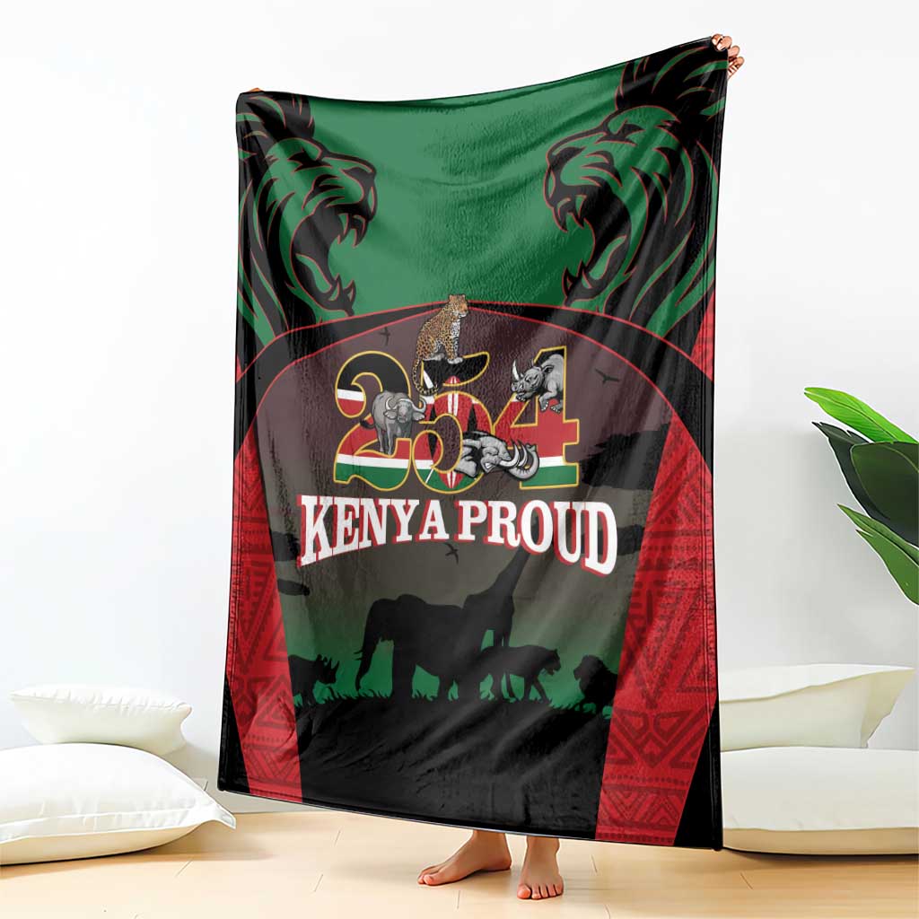 Safari animal blanket draped on couch; green center with lions and elephants text logo