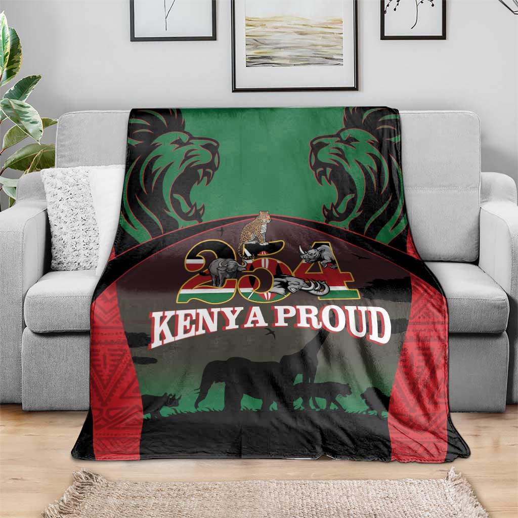 Safari animal throw blanket with red, green, and black border; lions and elephant graphic
