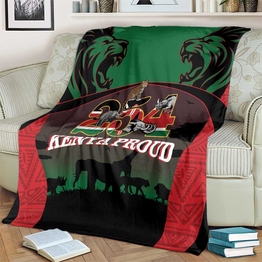 Safari animal throw blanket on sofa bed; green and black with lions, elephant and red border