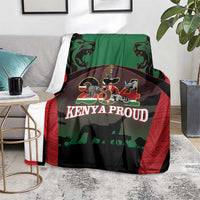 Safari animal throw blanket on floor; red, green, and black with lions and elephant artwork