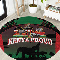Round safari-themed carpet with elephants and "KENYA PROUD" center text, round edge