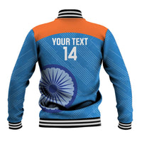 Back view of blue and orange women’s baseball jacket, number 14 and India wheel graphic