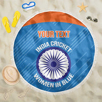 Blue round beach blanket with white fringe edge and India cricket graphic center