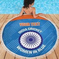 Blue round beach blanket with white fringe border and India cricket emblem design