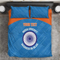 Blue bedding set with orange band and cricket logo, comforter plus two pillowcases