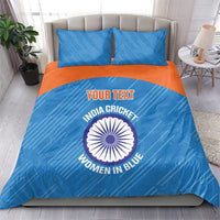 Blue bedding set with orange band and cricket logo, comforter and two pillowcases