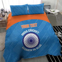 Blue bedding set with orange band, cricket graphic and logo on comforter with two pillowcases