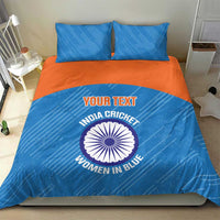 Blue bedding set with orange band, cricket graphic and logo on comforter, two pillowcases
