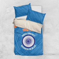 Blue bedding set with orange band, cricket logo on duvet, includes two pillow shams