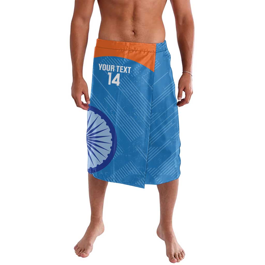 Women’s blue wrap skirt with orange waistband and circular graphic print, knee length