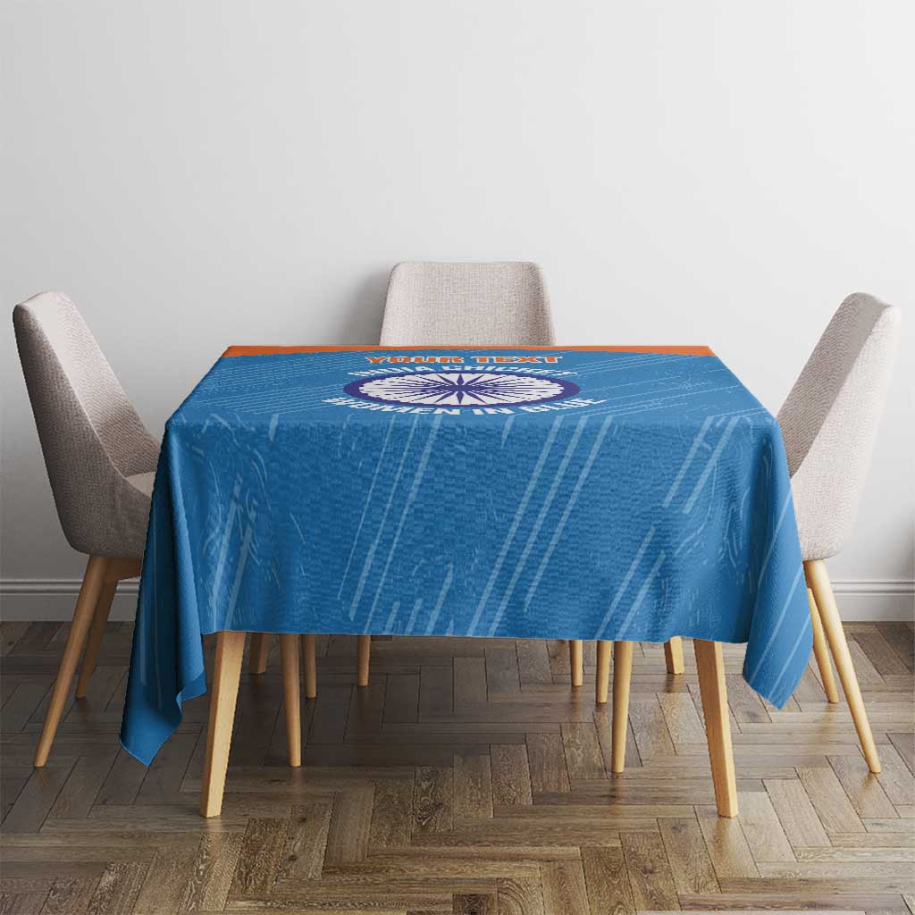 Blue cricket tablecloth featuring central circular emblem and woven-looking pattern