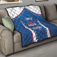 Blue USA volleyball quilt on a sofa, showing star border and 'YOUR TEXT' in center