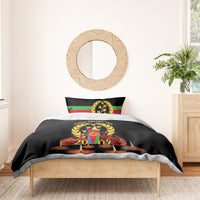 Black bedding with flag-striped pillow shams and central candle wreath design