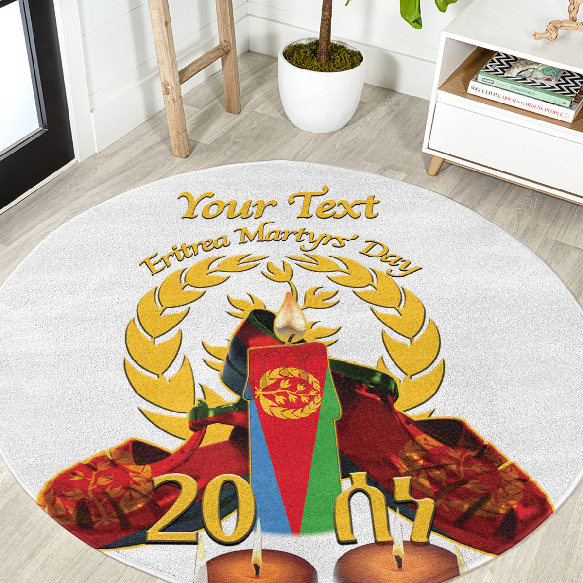 Round light-gray carpet close-up with gold laurel, candles, and Eritrea Martyrs' Day text