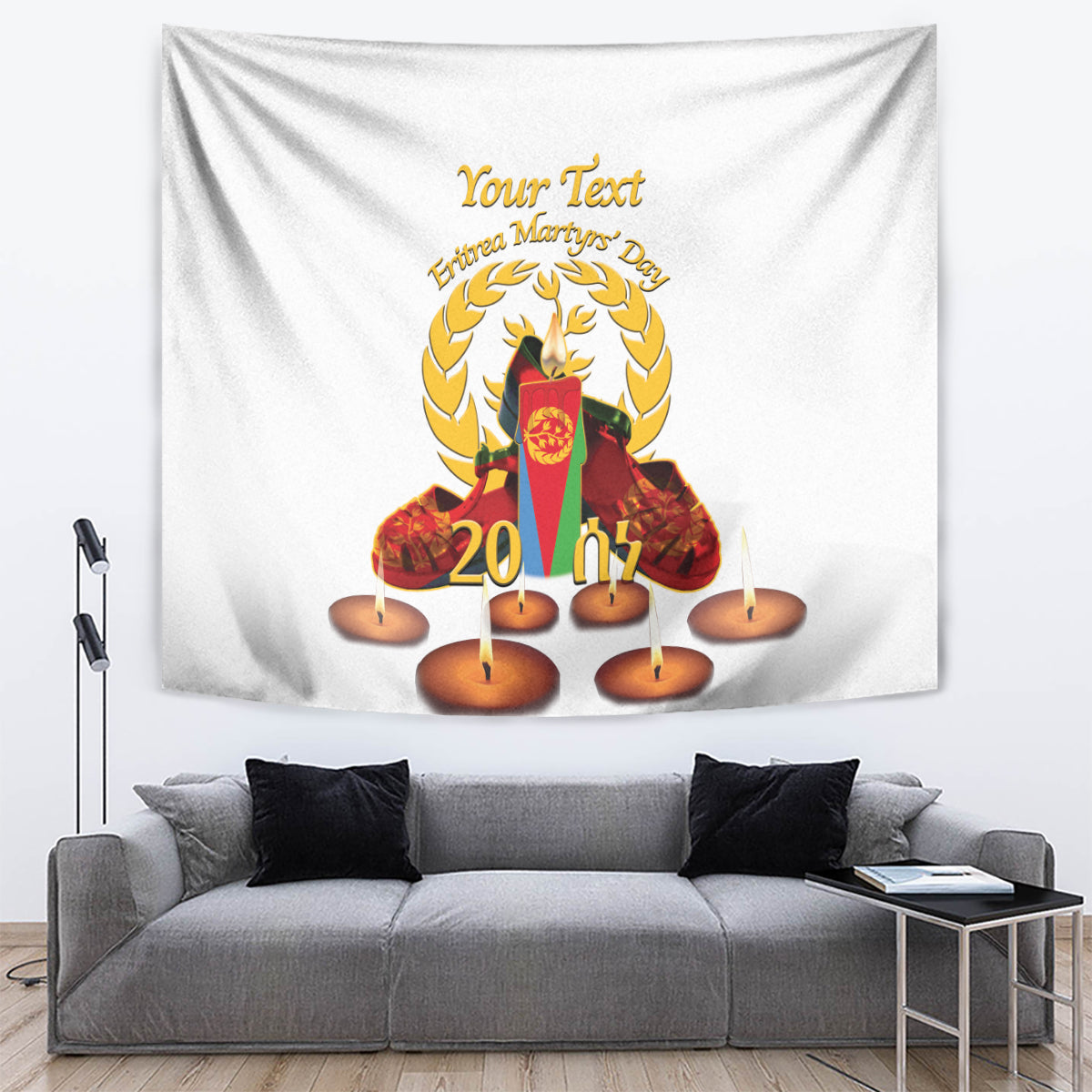 White memorial tapestry showing laurel crest, central figure, and lit candles