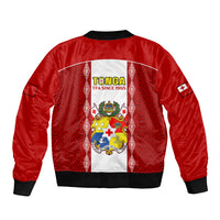 Red bomber jacket, black ribbed hem and cuffs, with Tongan crest on back panel