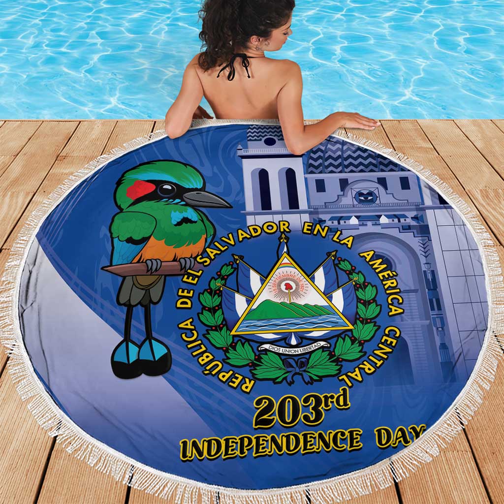 Blue round beach blanket with fringed edge, parrot bird and emblem centered on fabric