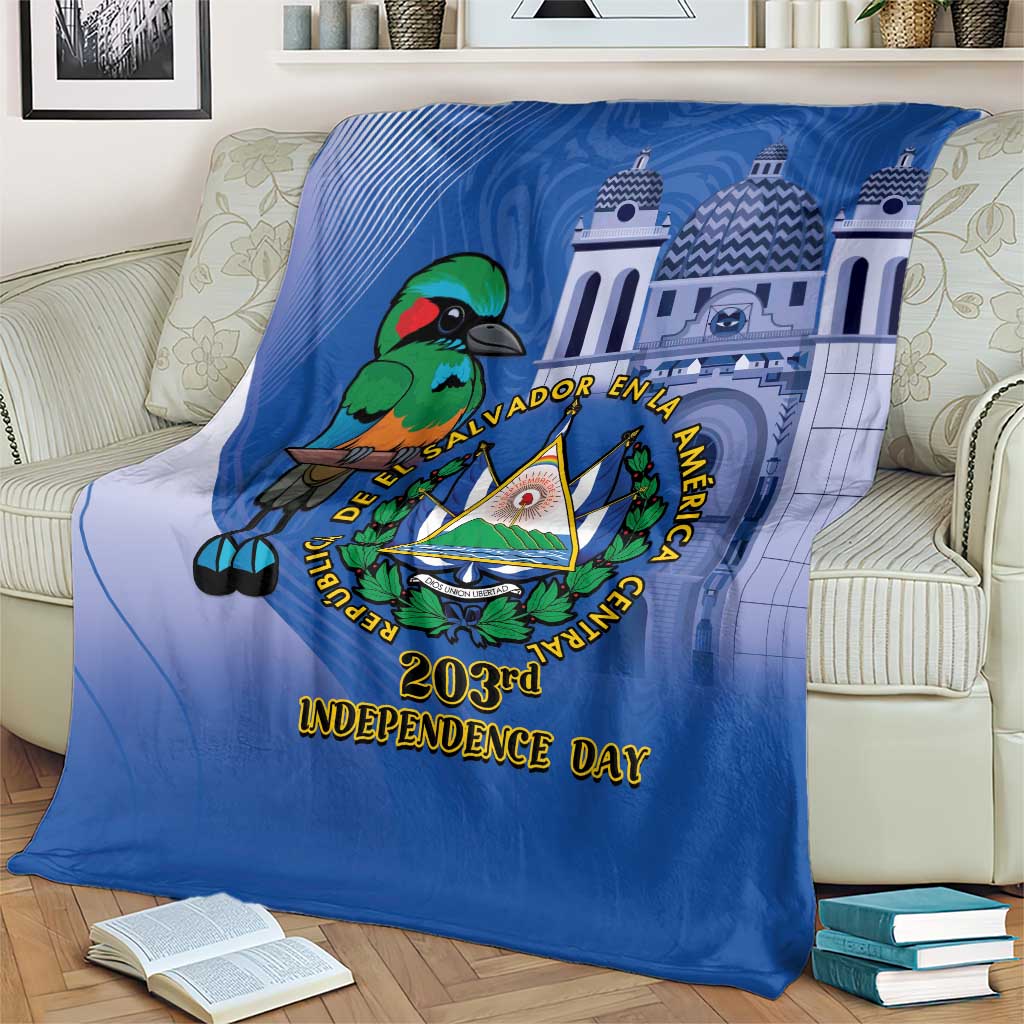 Blue Independence Day blanket with green bird, cathedral towers, and gold 203rd lettering