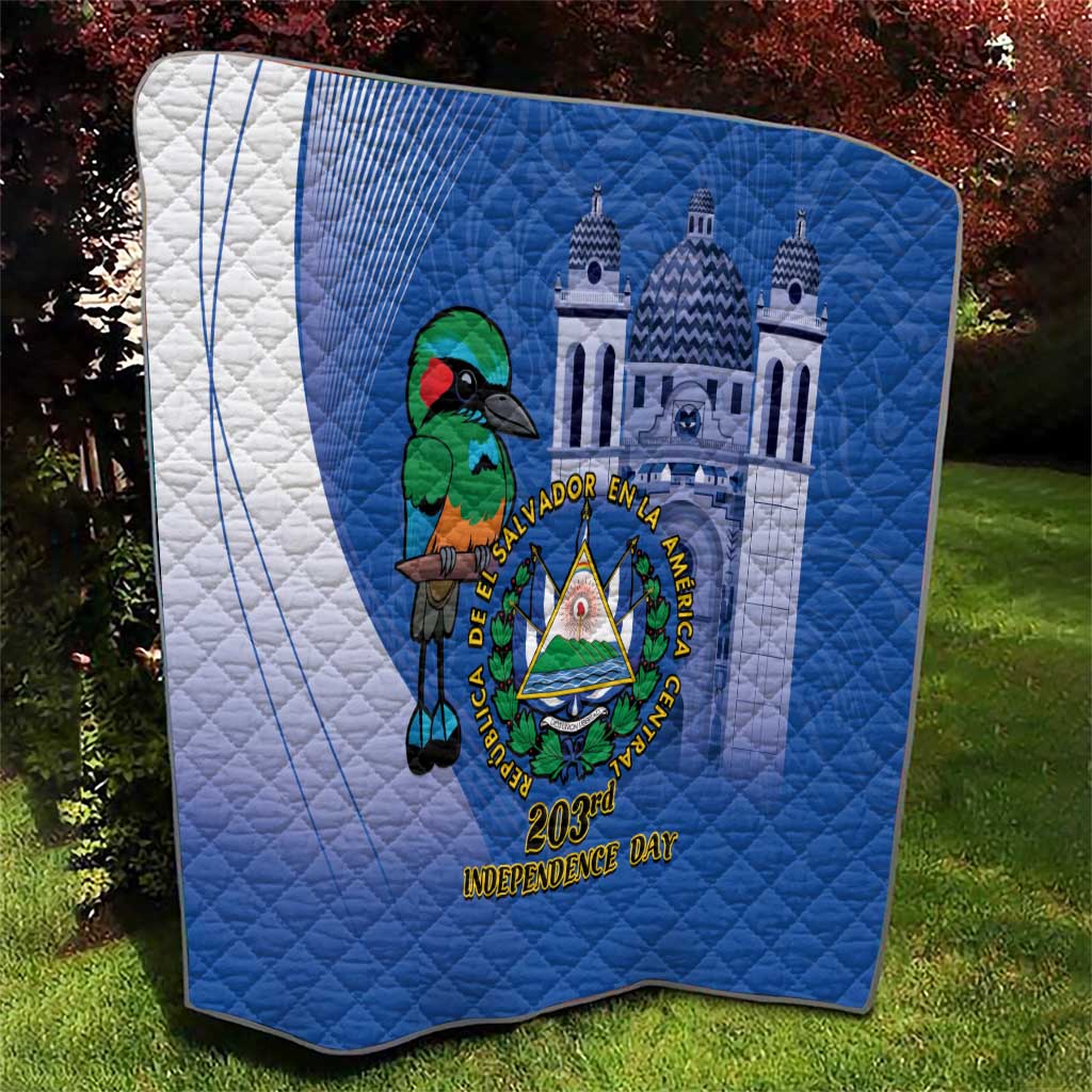 Blue quilt with white side panel and Central emblem featuring a bird and Independence Day text