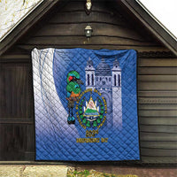 Blue wall-hung quilt featuring a bird with crest emblem, cathedral graphic, and “Independence Day”