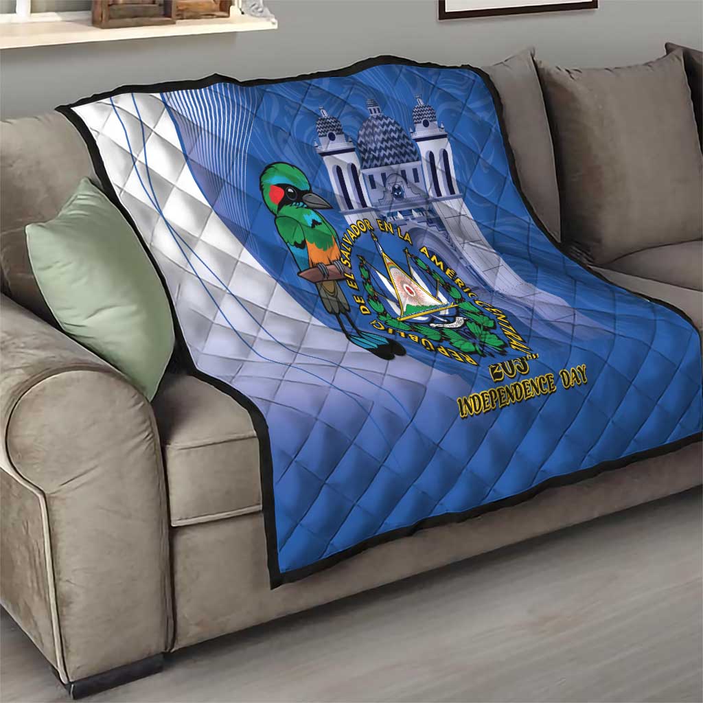 Blue couch throw quilt with white diagonal paneling, bird crest emblem, and Independence Day words
