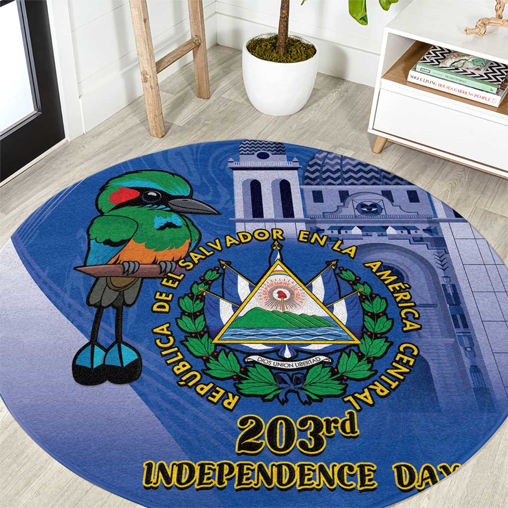Round blue independence day rug with torogoz bird, central emblem, and yellow 203rd text
