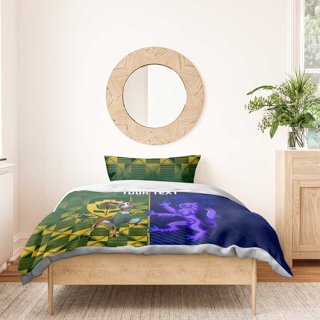 Custom bedding set on bed: green-and-blue cover with Your Text, mascot emblem and purple lion.
