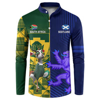 Rugby button sweatshirt with green left and blue right panels, crest and animal graphics