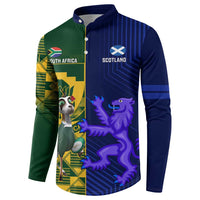 Rugby button sweatshirt with green left and blue right panels, long sleeves, front button placket