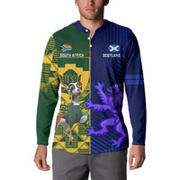 Rugby button sweatshirt on model, green and blue front with South Africa and Scotland emblems