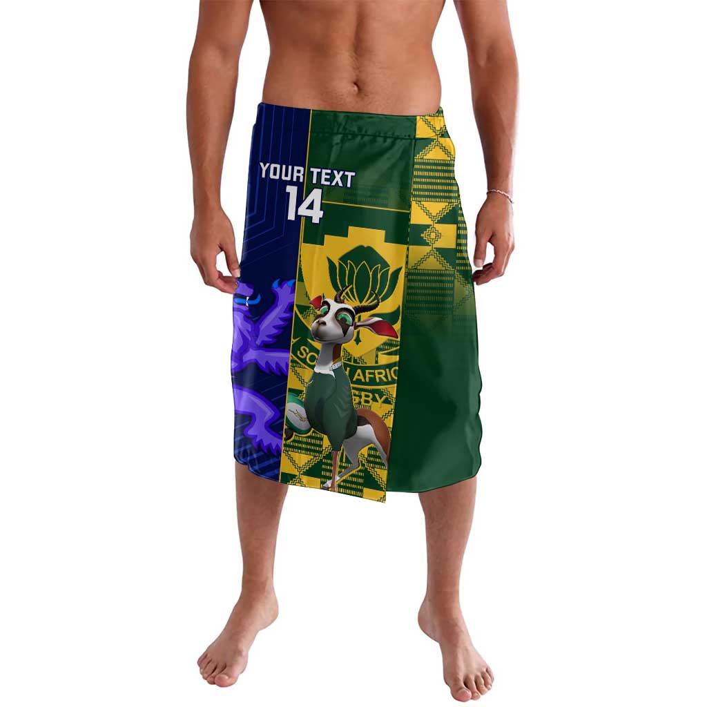 Green and blue graphic rugby lavalava shorts, elastic waistband, central emblem