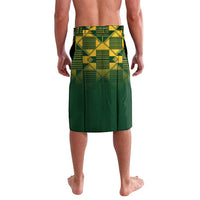 Green rugby lavalava shorts with yellow geometric pattern at waistband and back panel