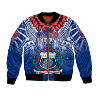 Blue zip-up rugby bomber jacket with colorful emblem, ribbed collar, cuffs & waistband