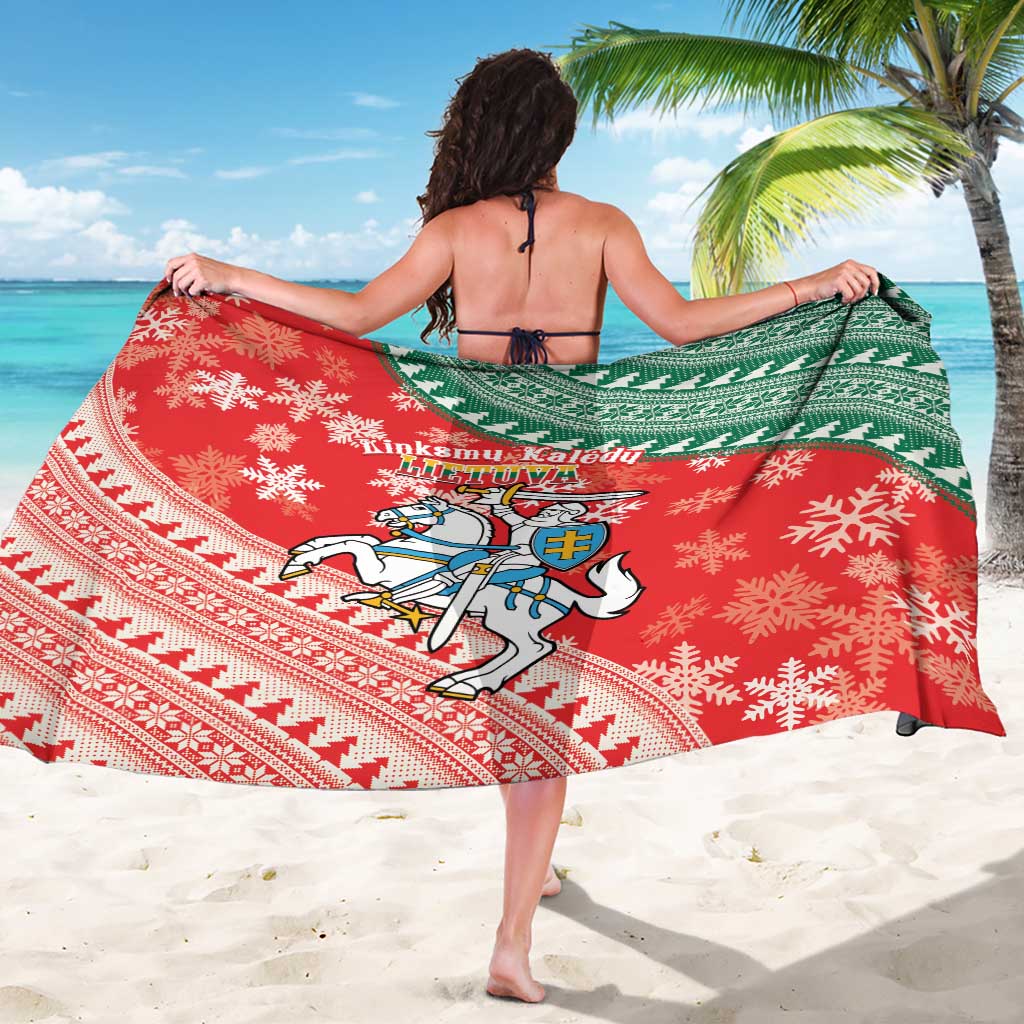 Red and green Lithuanian Christmas sarong with snowflake pattern and crest shield