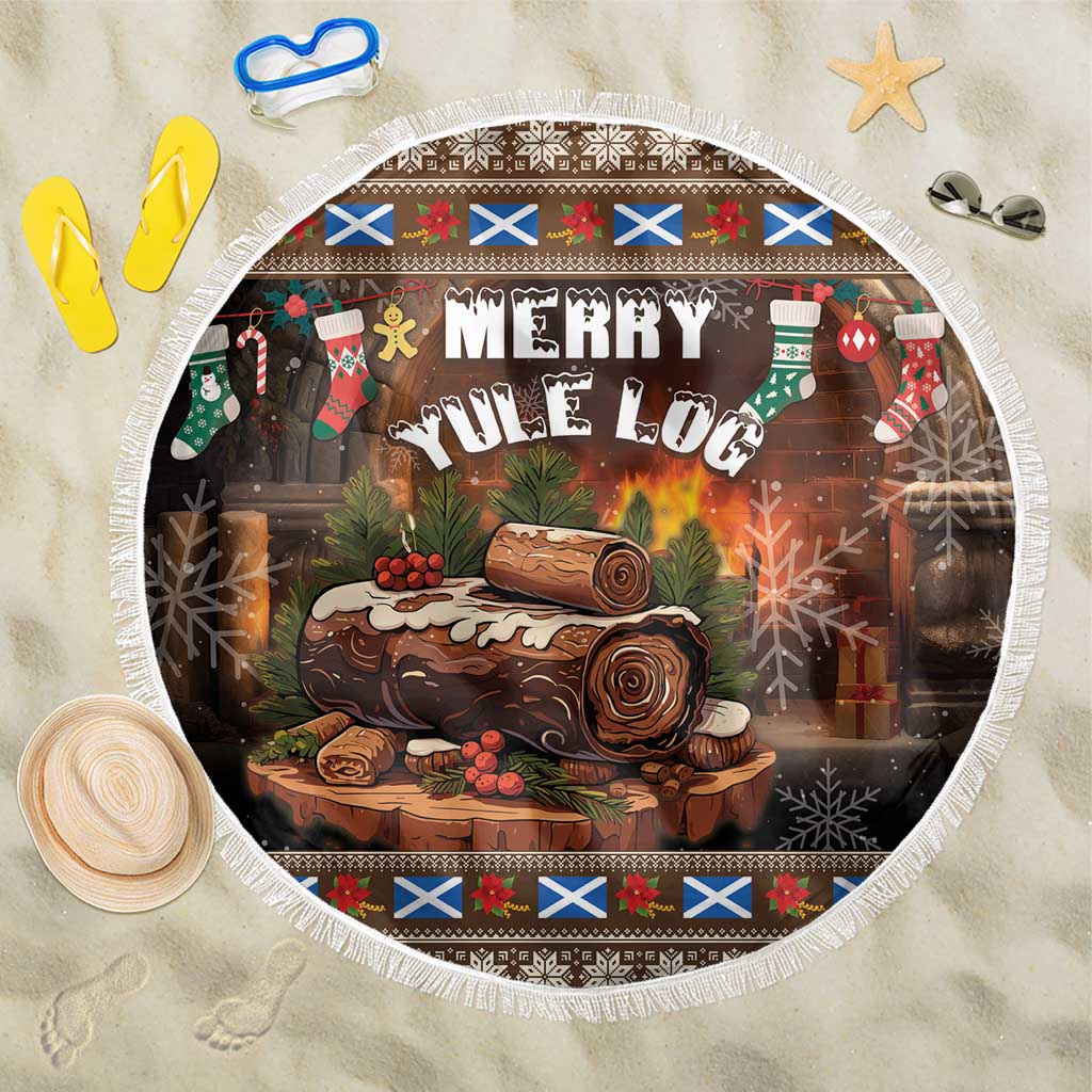 Round Christmas beach blanket with fringe edge and "Merry Yule Log" graphic