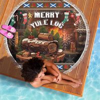 Circular fringe-edged beach blanket with "Merry Yule Log" winter scene print
