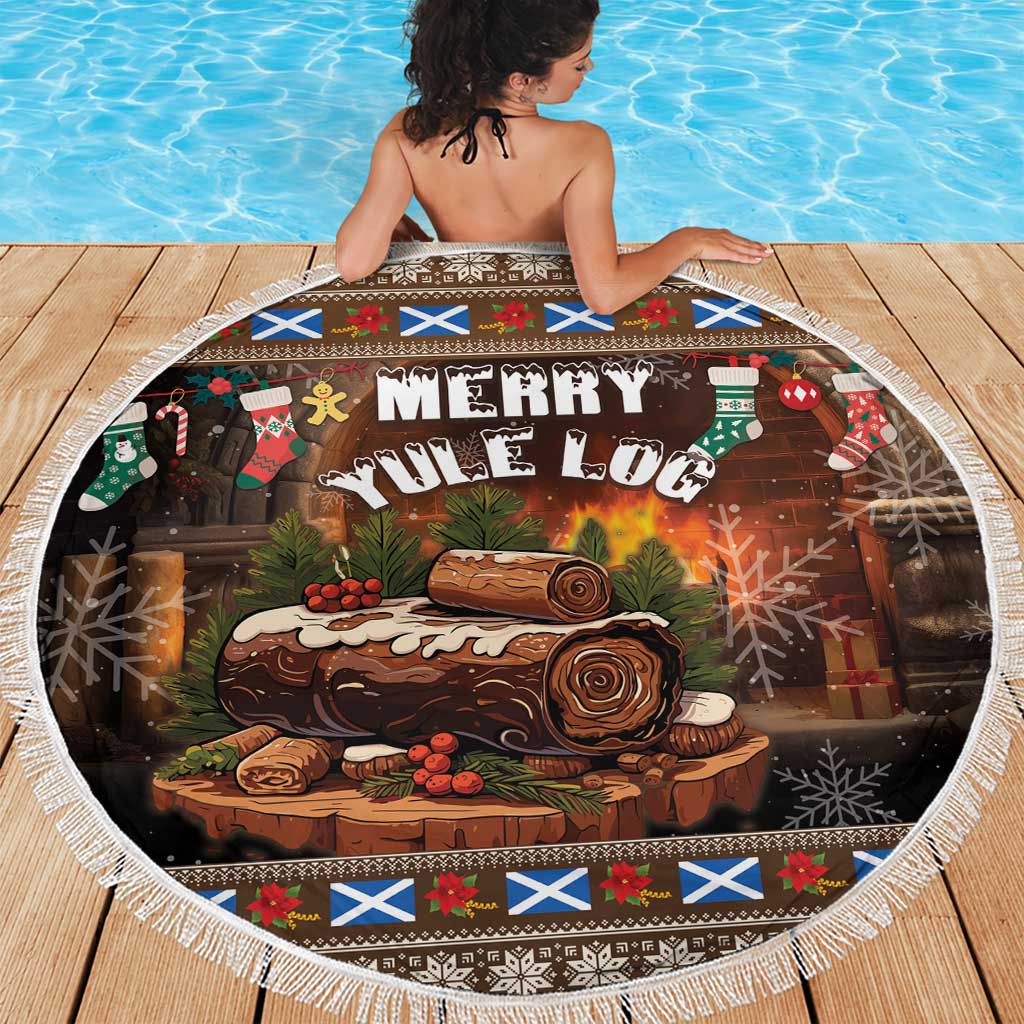 Round "Merry Yule Log" beach blanket with white fringe border and log graphic
