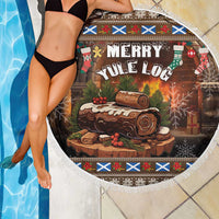 Circular fringe-edged beach blanket featuring "Merry Yule Log" Christmas artwork