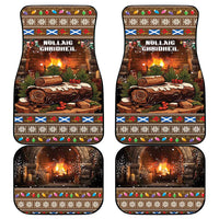 Set of four Christmas car floor mats with glowing hearth log and festive tartan border