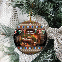 Round ceramic Christmas ornament with Merry Yule Log artwork and festive border