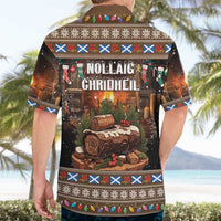 Brown Hawaiian shirt worn from back, “Noel” and “Christmas” holiday log print, short sleeves