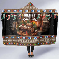 Christmas hooded blanket with Merry Yule Log print, colorful trim, and black fabric
