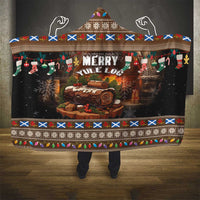 Christmas hooded blanket with Merry Yule Log scene, ornament border, and hood