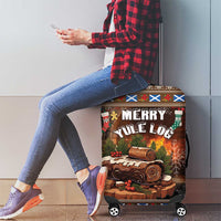 Brown luggage cover with “Merry Yule Log” firewood graphic and zipper edge, on wheels